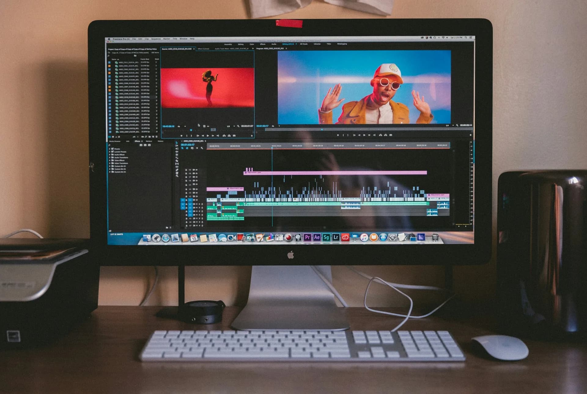 Desk with a laptop and notes for planning a video production