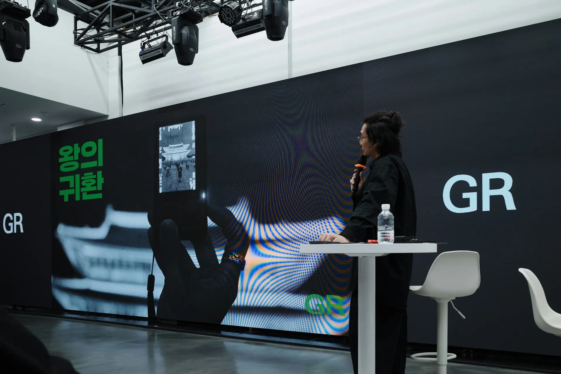 Speaker on stage during a corporate event in Madrid