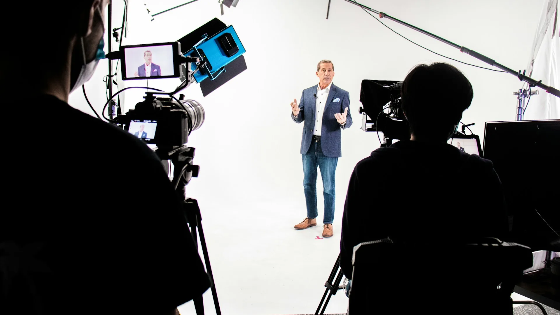 Promotional video set for a business with camera, lights and camera operator