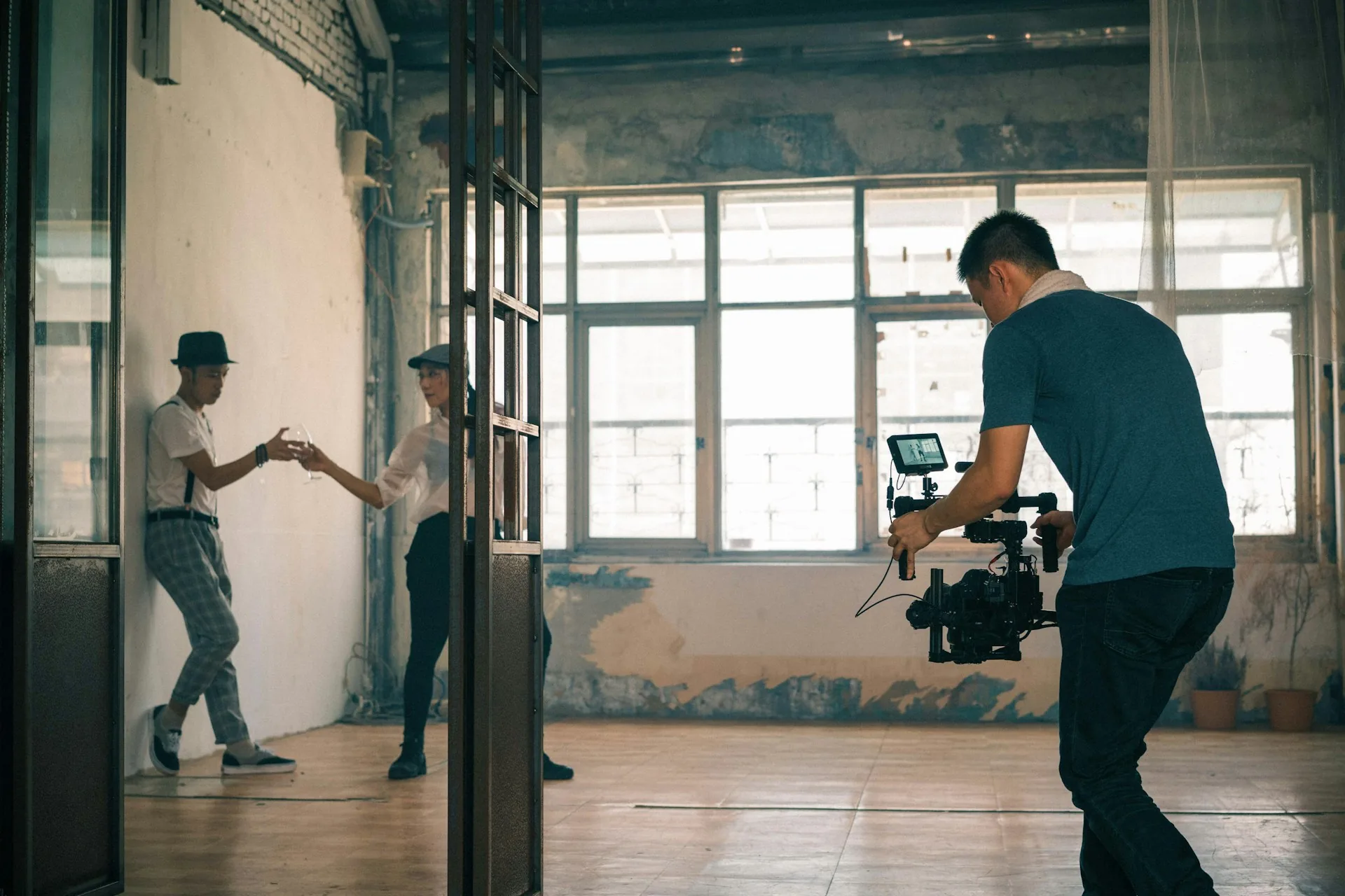 Corporate video director with a professional camera preparing a shoot in Madrid