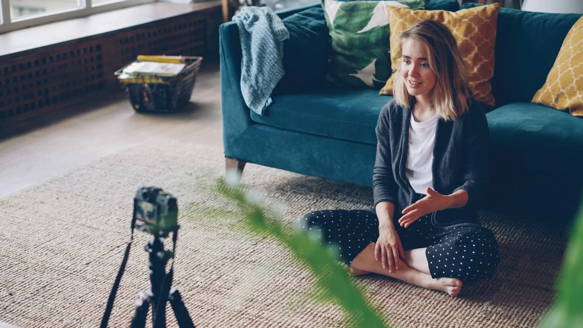 Filmmaker recording a piece to camera in a corporate production studio
