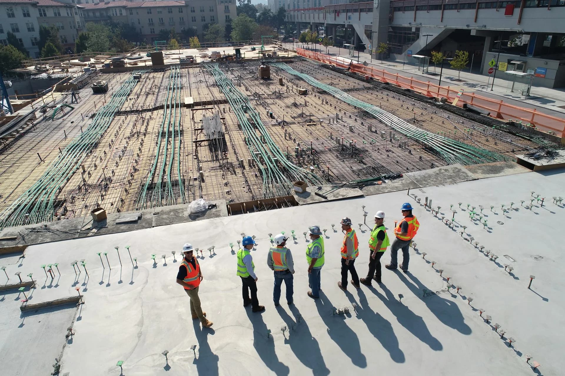 Group of construction workers standing on a building site